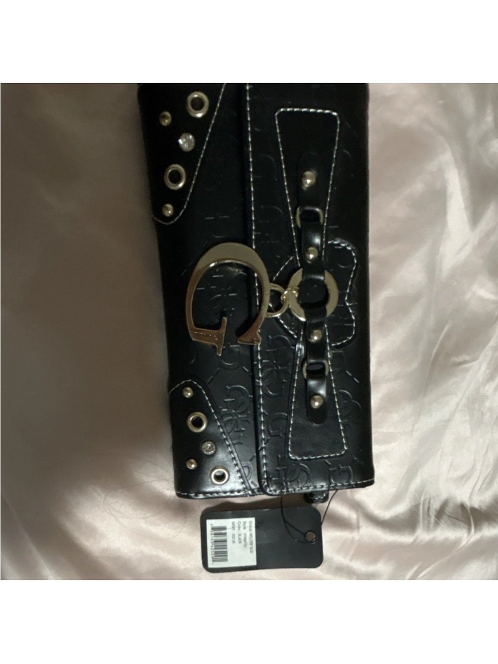 Guess Black Trifold Wallet with tags brand new vintage.Never used Vintage also .